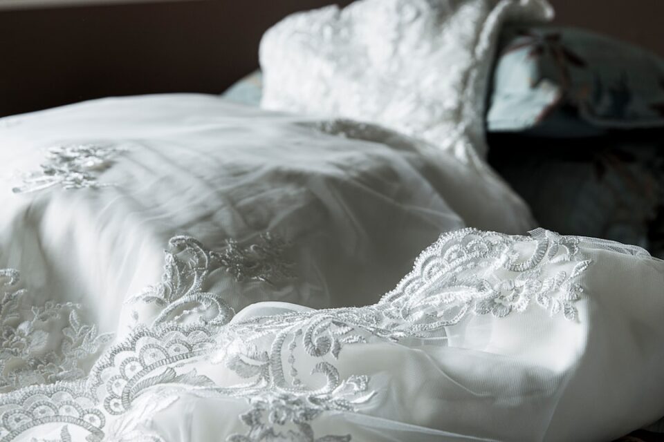 wedding dress up guide cover illustration with gown, veil, shoes and checklist