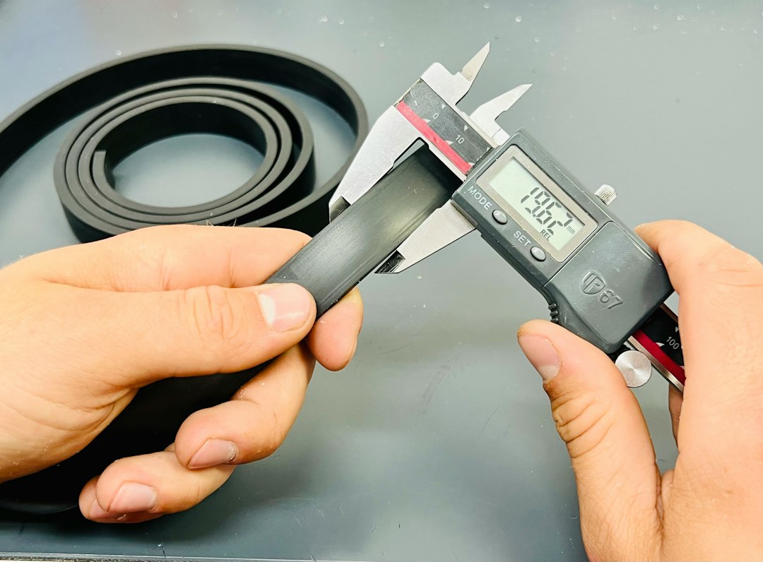 leather belt size guide cover illustration showing measuring a belt with a tape measure